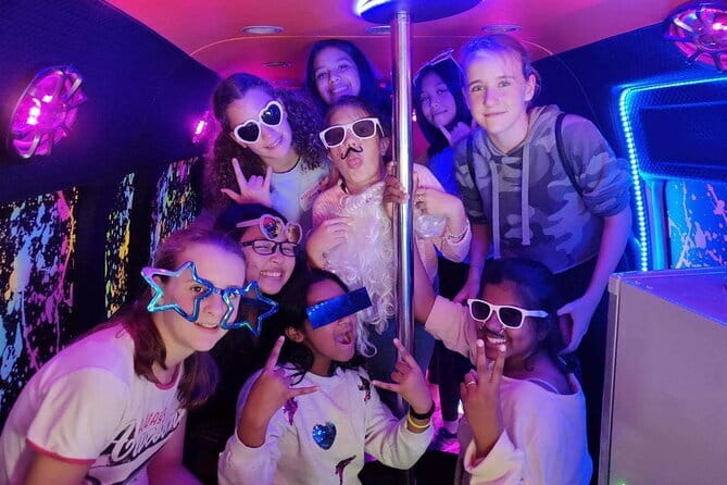 Private Party Bus Shared Tour in Singapore - What the music, lights, and props add