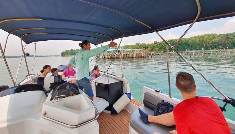 Singapore: Guided Boat Tour and Kelong Fish Farm Visit - Learning the language of Singapore’s sea channels
